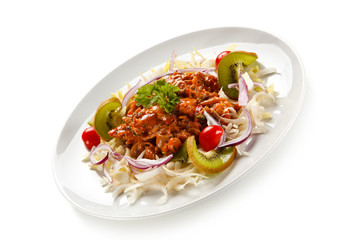Rice noodles with meat, sauce and vegetables 