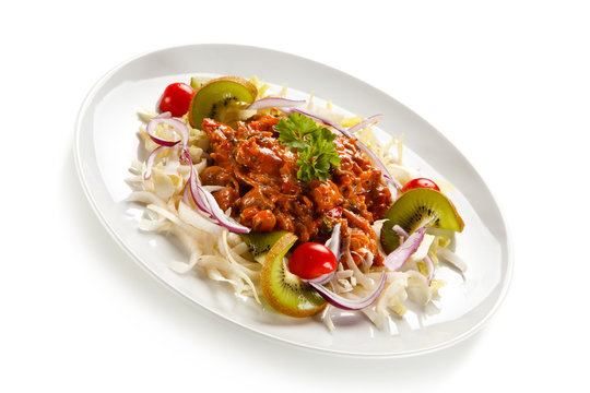Rice noodles with meat, sauce and vegetables 