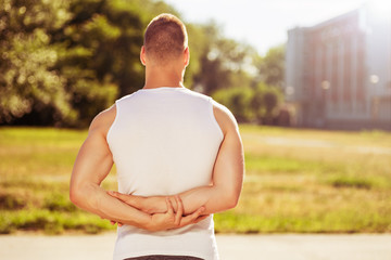 Young man  exercising outdoor.