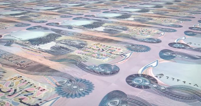 Banknotes of five thousand dinars iraq rolling, cash money, loop