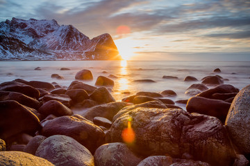 Beautiful sunset over lofoten islands, norway, in a stormy day