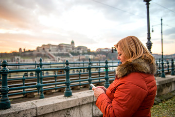 Nice woman on the street with a phone 