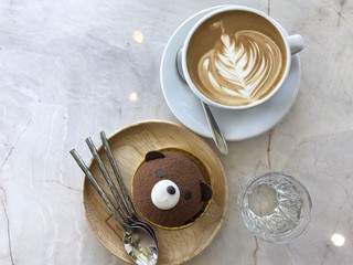 a little bear cake and hot caramel latte macchiato art 
