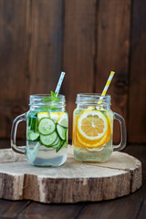 Lemonade of lemon, cucumber, orange and mint. Detox water. Top view. The concept of a diet, a vegetarian, healthy food and a lifestyle.
