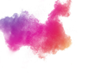 abstract multicolored powder splatted on white background,Freeze motion of color powder exploding