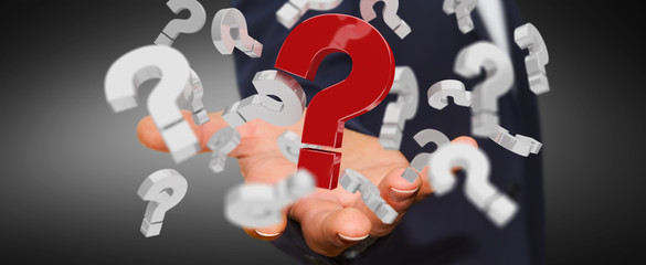 Businessman using 3D rendering question marks
