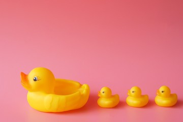 Rubber duck over pink background color 