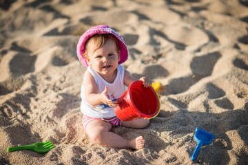 Caucasian little girl playing with bach toys