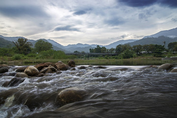 Small rock brook in tropical forest. (Un-focus image)
