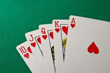 Full house poker on green background