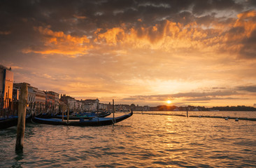 Gondolas in the Grand Canal at sunset, Venice, Italy