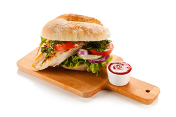 Sandwich with chicken fillet and vegetables