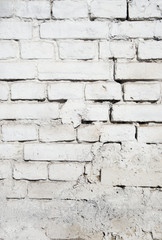 old brick wall texture background with worn off paint