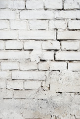 old brick wall texture background with worn off paint