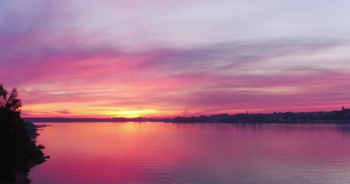 beautiful pink sunset over the river, aerial shot