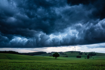 Fototapeta na wymiar Storm clouds over the field in Saxony, Germany
