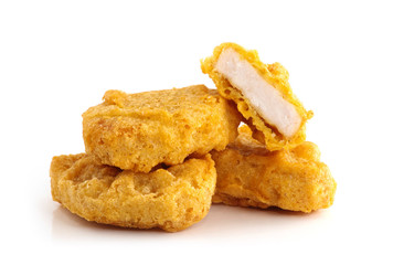 Fried chicken nuggets isolated on white