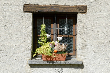 Fototapeta na wymiar Rural window of a house at the village of Sorengo
