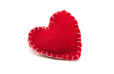 Felt red heart isolated on a white background
