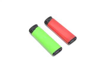 Зажигалка на белом фоне крупным планом 