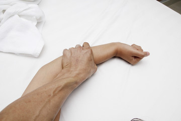 A hairy man's hand holding a woman hand for rape and sexual abuse concept