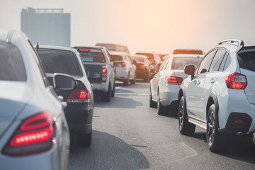 traffic jam on toll way with row of cars
