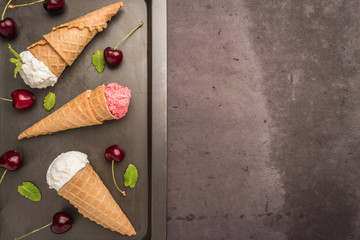 Traditional waffle cones for ice cream on wooden table.