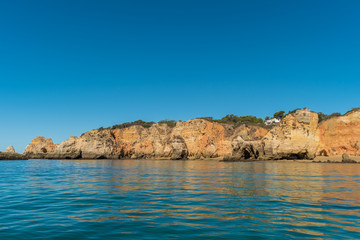 Fototapeta na wymiar Scenic golden cliffs near Alvor, Portimao, Algarve