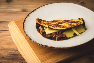 Traditional meal on pancake served on dish