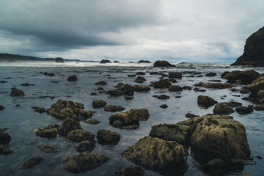 Beach boulders on a cloudy day.