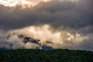 gorgeous cloudscape over the mountains at sunrise