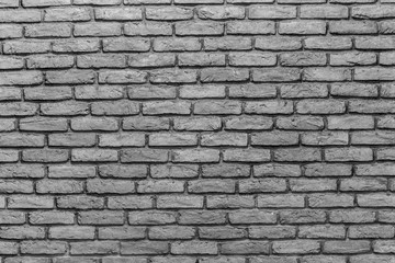 The wall is decorated as a brickwork. Texture of a brick wall as an interior decoration.