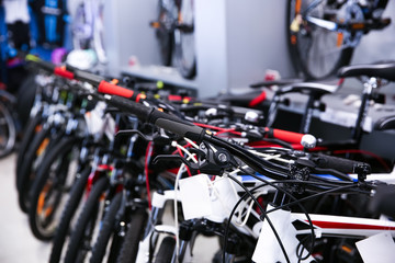 Fototapeta na wymiar Modern new bicycles in shop