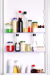 Many different sauces in fridge