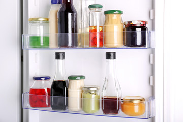 Many different sauces in fridge