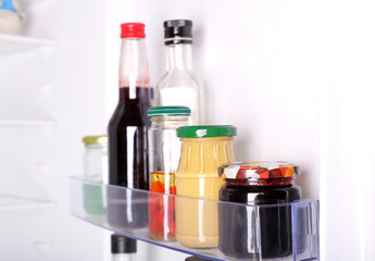 Many different sauces in fridge