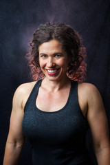 Portrait of Smiling Female Weightlifter