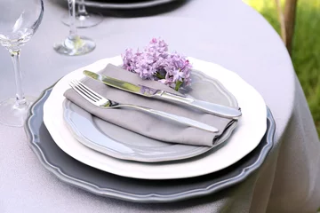 Foto op Plexiglas Beautiful table setting with lilac flowers decoration © Africa Studio