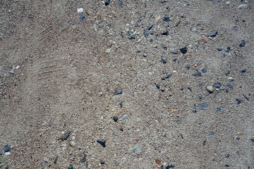 Sand with pebbles surface for background 