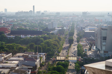 Obraz premium bird view over city on sun rise in Surabaya, Indonesia