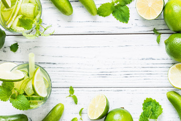 Refreshing drink with cucumber, lime, mint. Top view, copy space