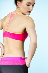 Fototapeta premium Woman with medical kinesio taping on back