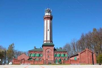 Old lighthouse on the Baltic Sea in Niechorze, Poland © oxygen64