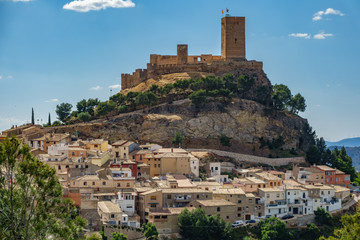 Fototapeta na wymiar Biar castle at top of hill over town, Alicante, Spain