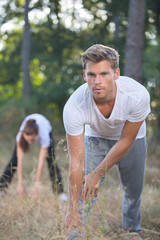 Fototapeta premium handsome man and woman running together