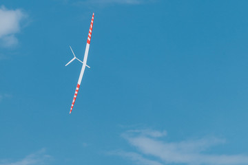 RC soaring plane on blue sky