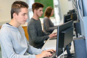 shot of young students sitting in a computer room