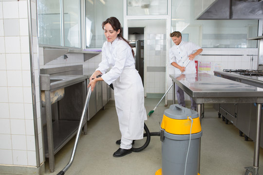 cleaners with vacuum cleaner in kitchen