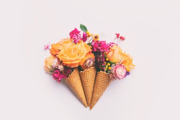 Roses and other flowers in waffle cones