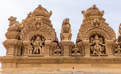 Nanjangud, India - October 26, 2013: Double Niche in beige elaborately decorated sandstone at...
